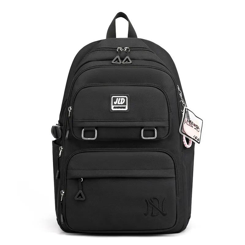 Large capacity nylon school backpack for girls in a choice of colours and patterns, showing ergonomic backplate.