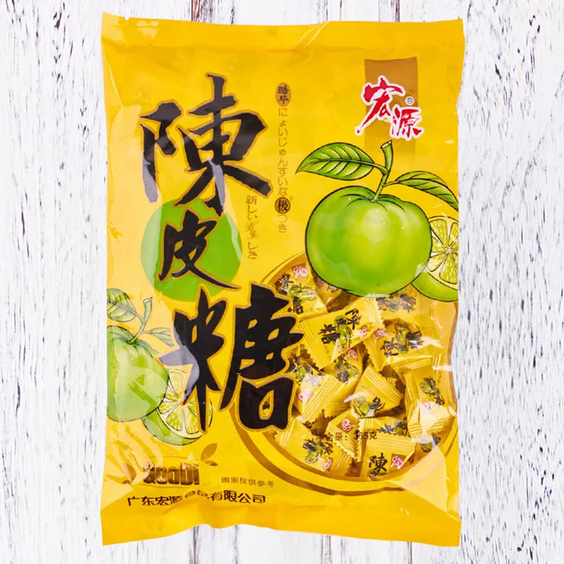Bag containing three packets of hard candy: guava, plum sugar, and tangerine peel flavours.