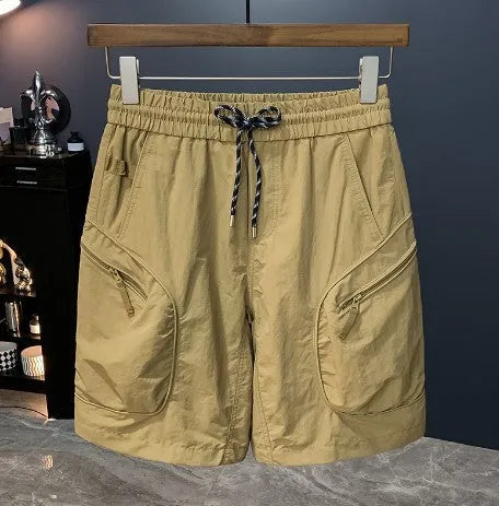 Men's camouflage pattern cargo shorts shown in loose knee-length fit on a mannequin