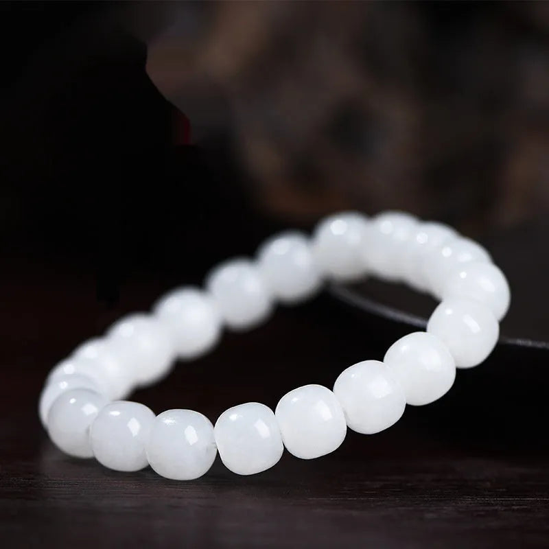 White jade barrel bead bracelet in Hetian jade showing three bead size options for men and women
