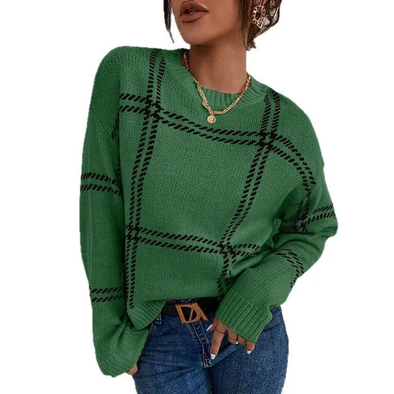 Women's loose fit plaid colour-block acrylic sweater with crew neck in striped apricot, black, beige, red, and green design.