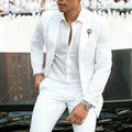 Men's white slim fit two-piece suit for weddings, shown on a hanger.