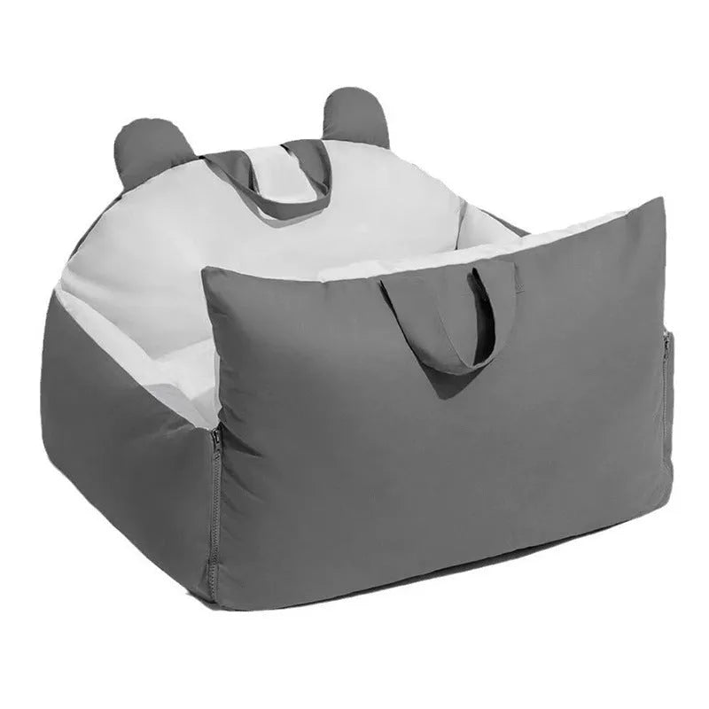 Blue beige universal dog car kennel with removable washable cover shown in a vehicle boot.