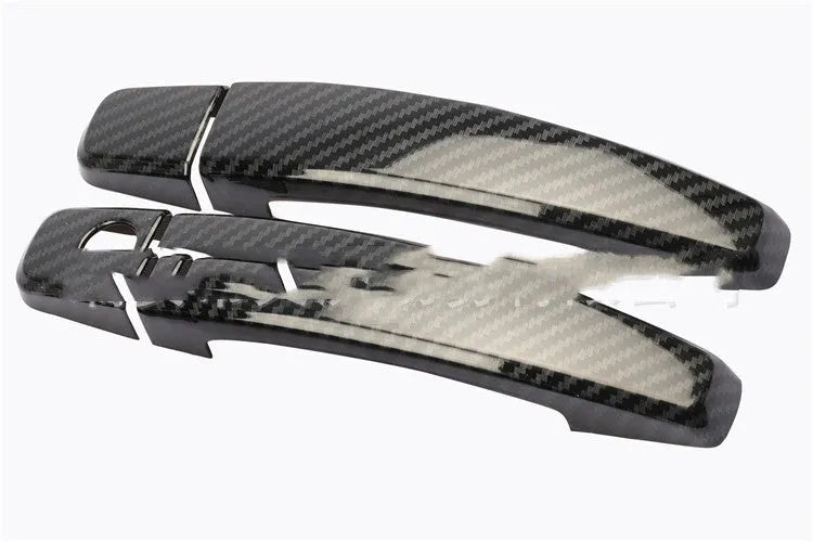 Carbon fibre pattern stick-on overlay for Opel Vauxhall Astra 2004-2015 interior door handle.