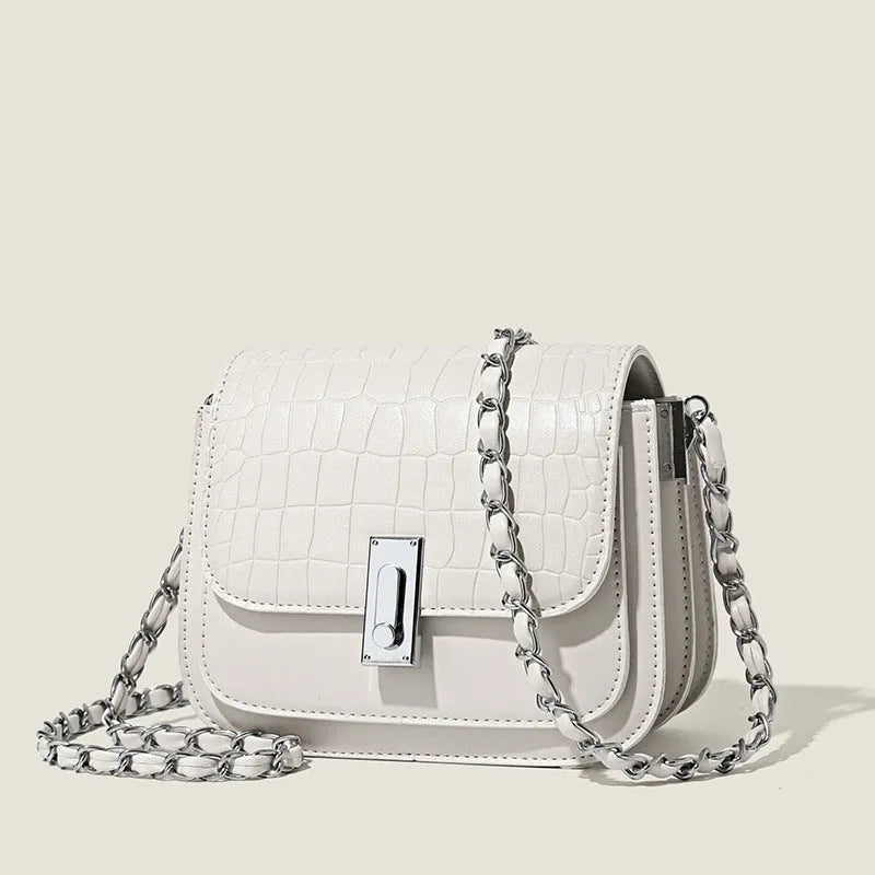 Women's soft PU leather shoulder bag with chain strap in horizontal square shape showing sandwich pocket design