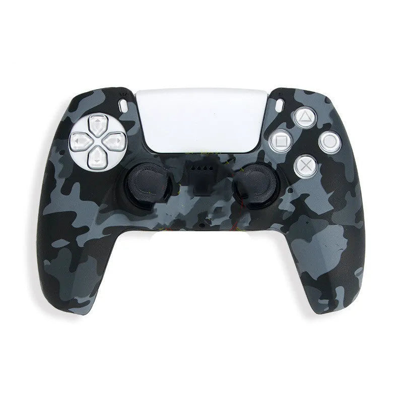 Camouflage silicone case fitted on a PS5 controller handle showing textured surface and snug fit