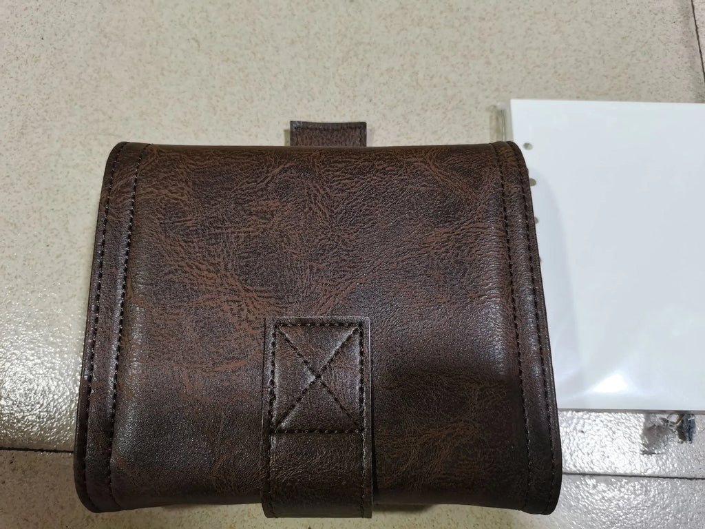 Brown retro leather-style A7 notebook with buckle closure and loose-leaf binding
