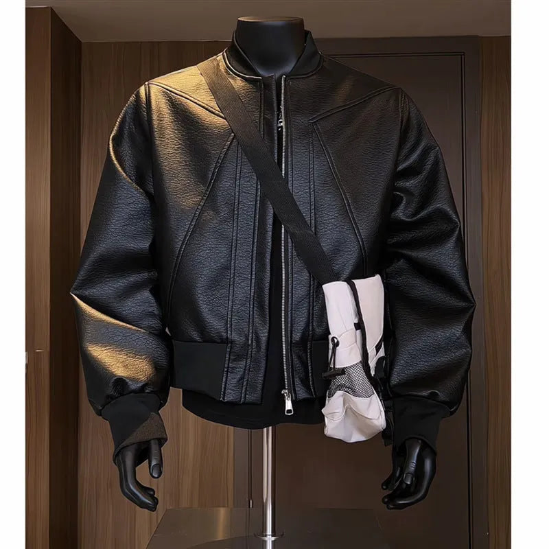 Men's black PU leather jacket with litchi pattern texture and extended length, shown in slim-fit light business style