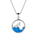 White gold electroplated copper necklace with geometric sea fishtail pendant in blue opal colour.