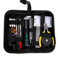 Black plastic and metal guitar repair kit for guitar, bass, mandolin, and banjo.