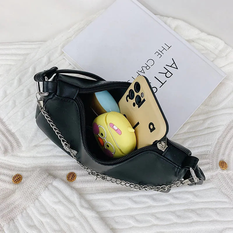 Horizontal square PU leather crossbody bag with butterfly chain detailing in light blue colour
