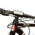 Black USB rechargeable bicycle headlight with wave induction sensor on a bike handlebar