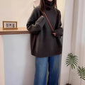 Women's thick turtleneck sweater with curling pile collar in loose fit