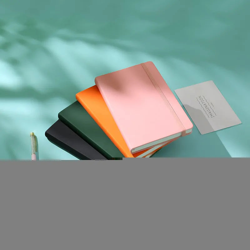 A5 tactile PU hardcover notebook in black with adhesive binding and 100gsm white paper