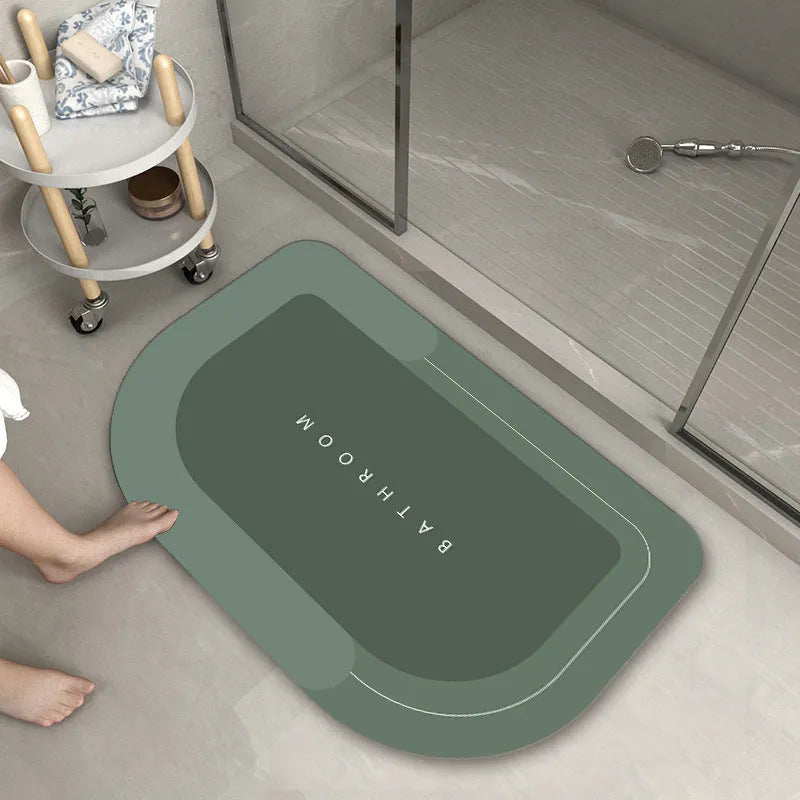 Cushioned blue oval bathroom floor mat on tiled flooring
