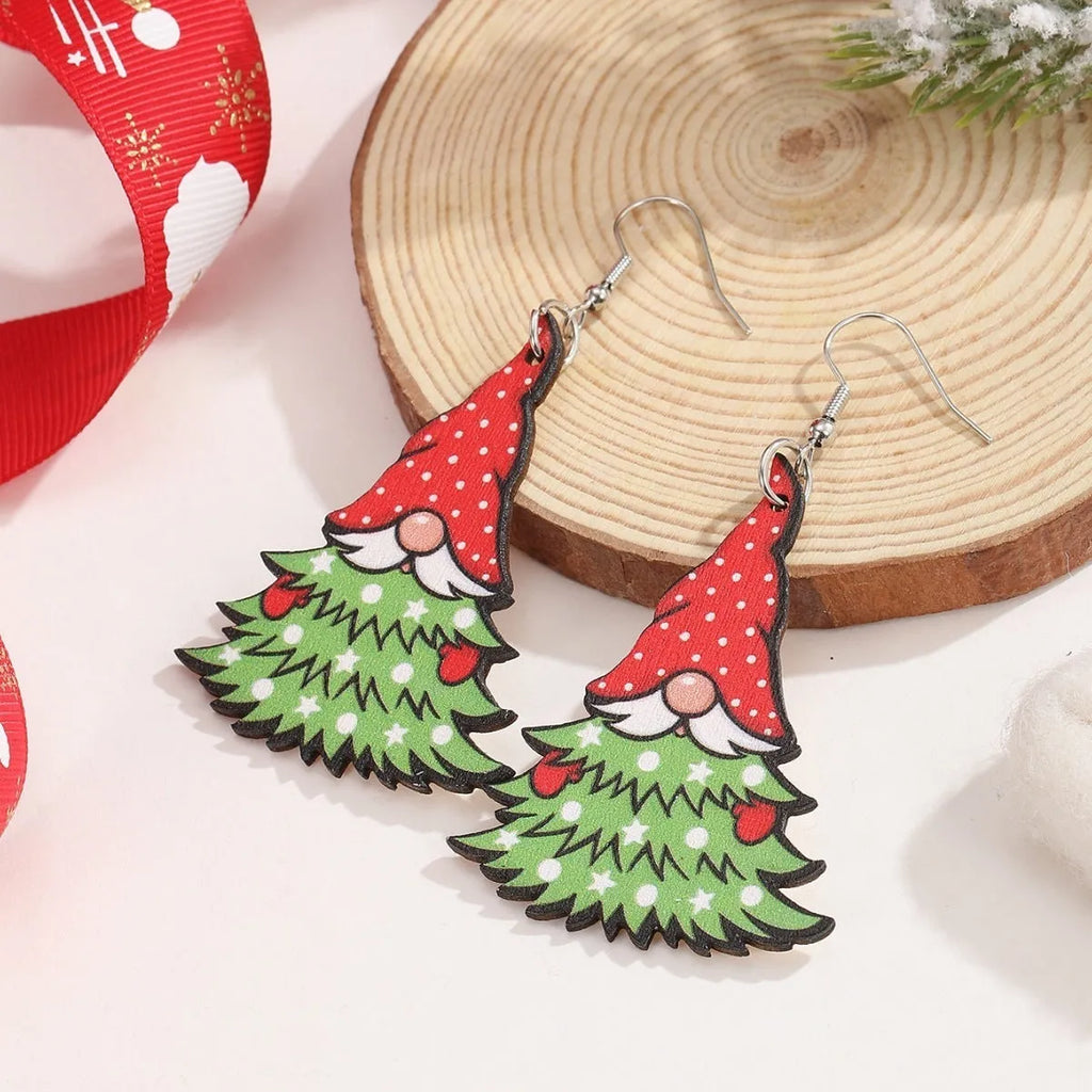 Wooden Christmas earrings showing Christmas tree design and water drop snowman design with festive printing