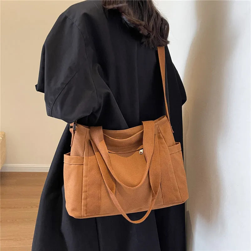 Large capacity polyester canvas shoulder tote bag in solid colour with phone compartment
