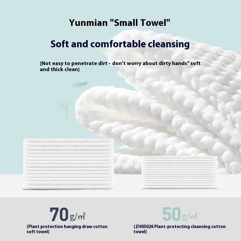 A roll of disposable white face cloths with a removable hook for hanging storage.