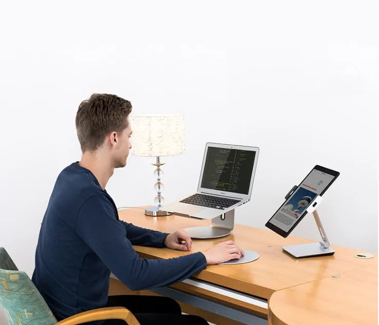 Foldable aluminium desktop phone and tablet holder showing rotation mechanism