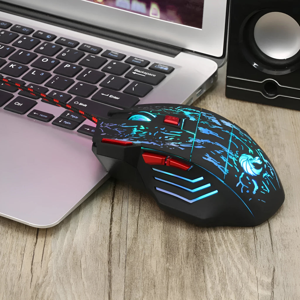 H300BK wired gaming mouse with LED lighting and luminous side panels on desk