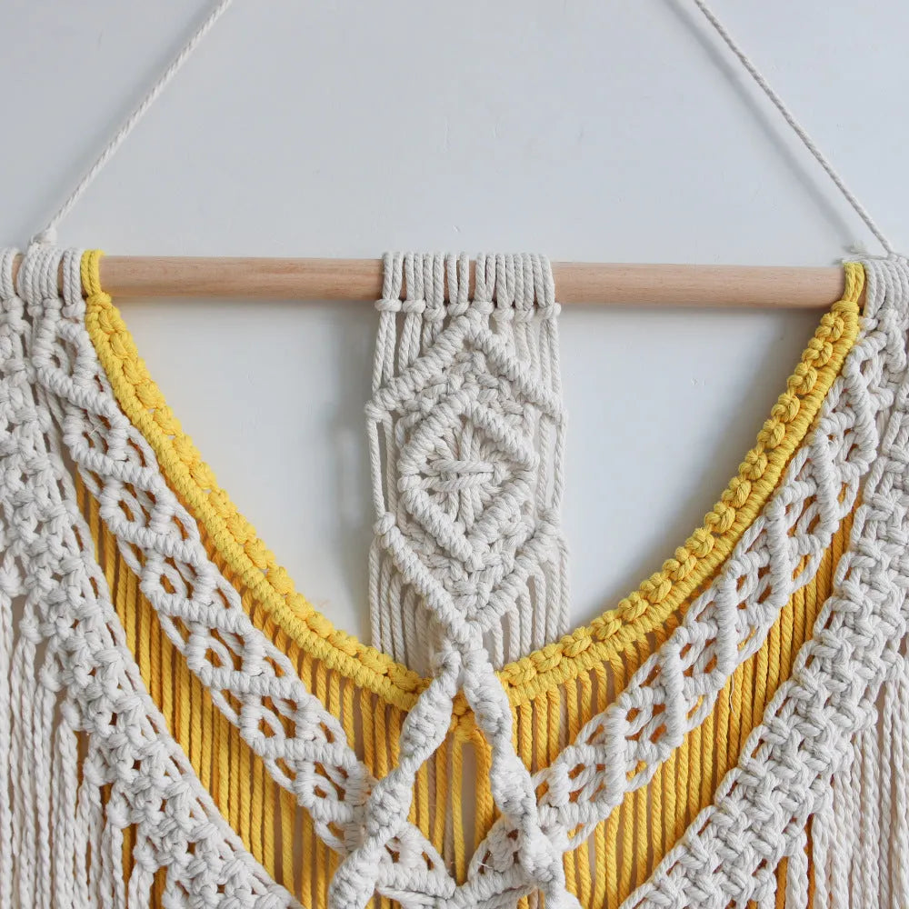 Rectangular creamy white cotton tapestry with colour woven details measuring 120cm by 95cm