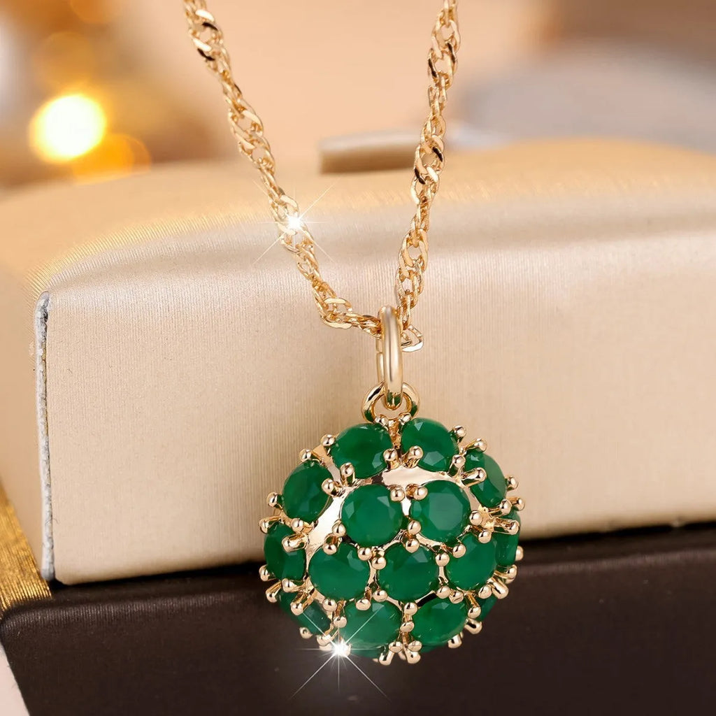 Round emerald and diamond necklace with champagne gold finish on 51-60cm chain