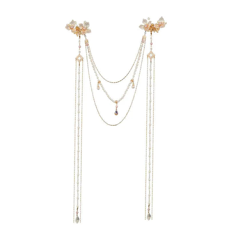 Gold grip hairpin with white pearl, clear diamond, flower decoration, and a long beaded tassel.