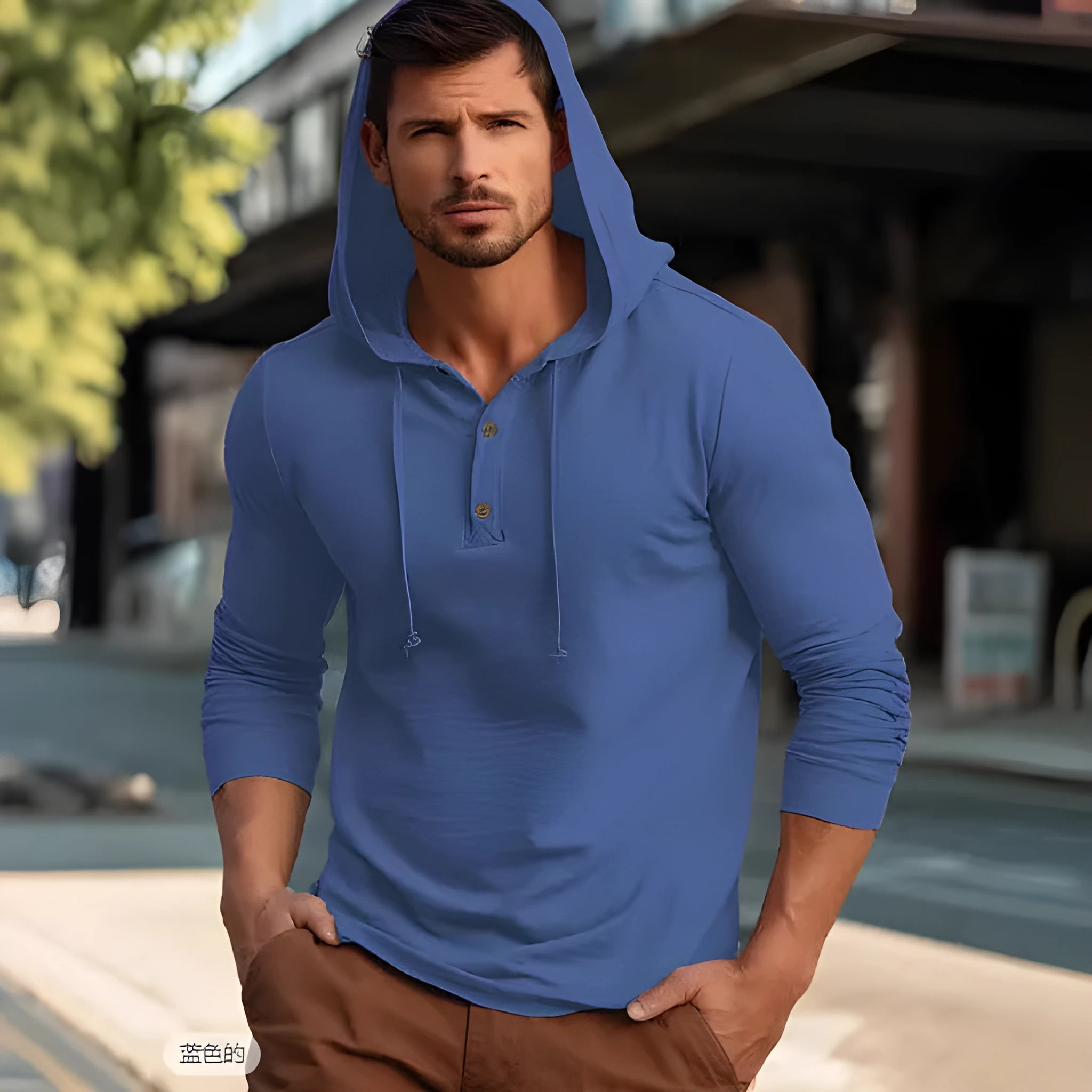 Cotton pullover sports hoodie in apricot colour on a hanger.