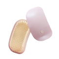 Pink electric pet massage brush with TPE comb teeth for cats and dogs