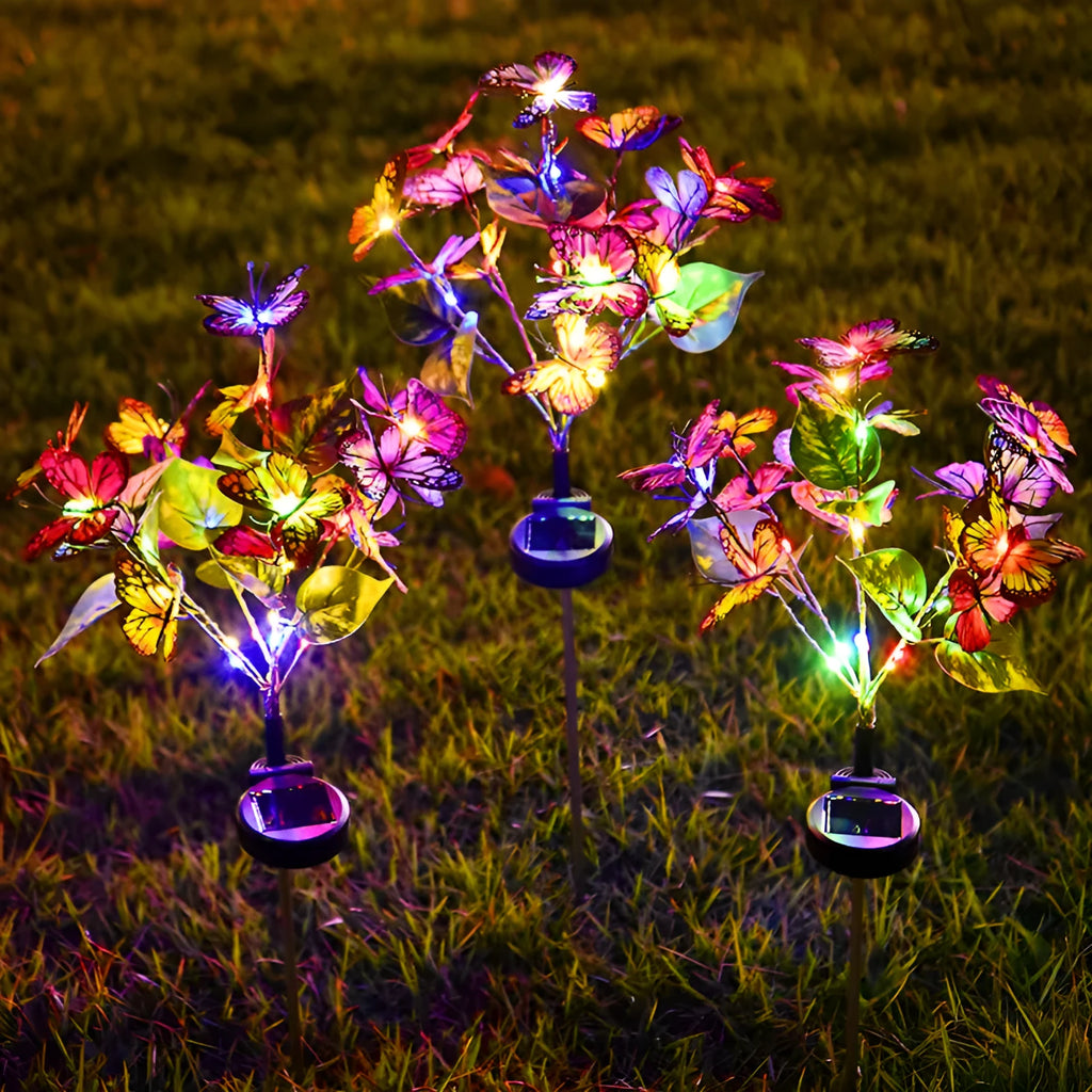Solar butterfly courtyard light LED lawn lamp with IP65 protection, four colour options, on grass