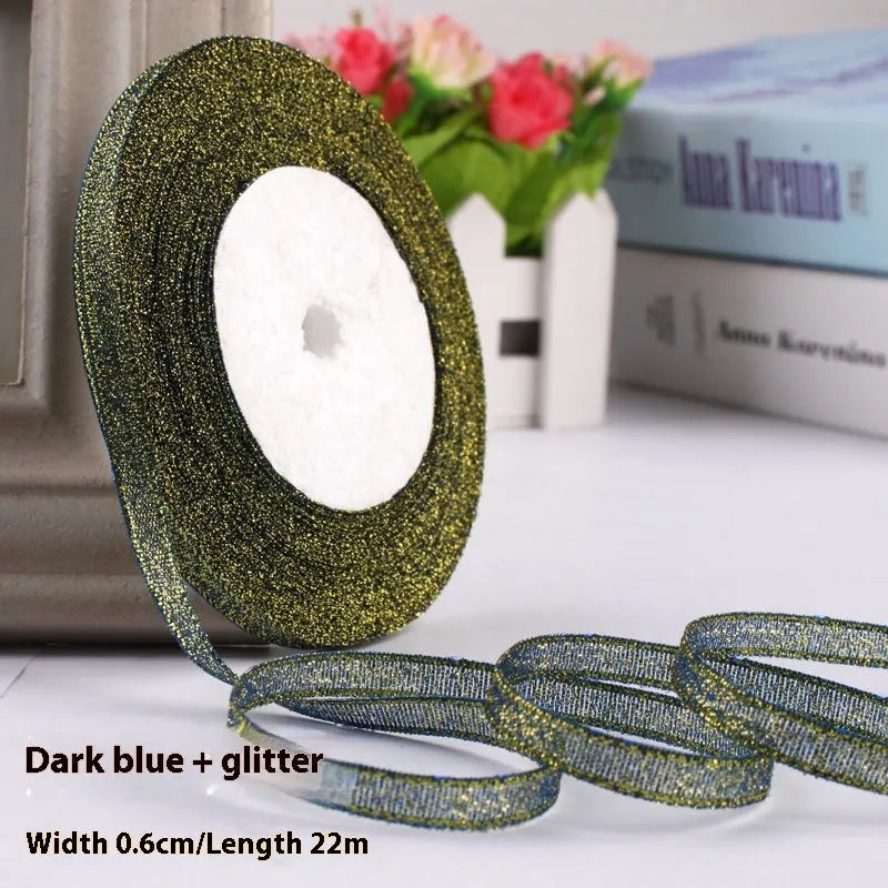 Roll of narrow 0.6cm wide polyester decorative ribbon in multiple colour options including metallic finishes