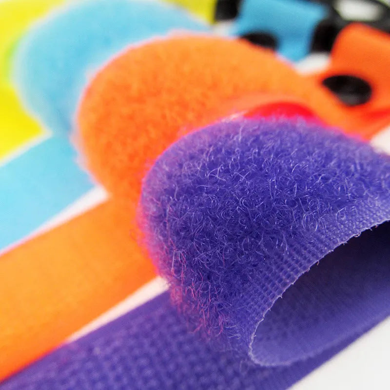 Nylon luggage velcro hook showing multiple colour options against travel bag background