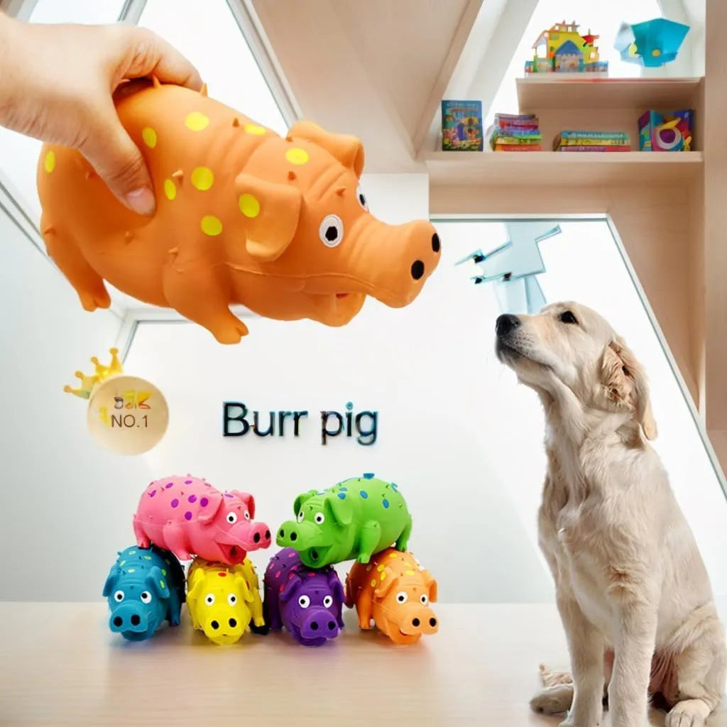 Blue pig-shaped latex dog chew toy with squeaker for aggressive chewers and teeth cleaning