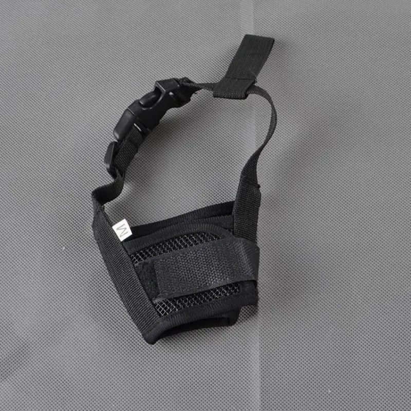 A plastic adjustable dog muzzle shown in multiple colours including black, blue, and pink.