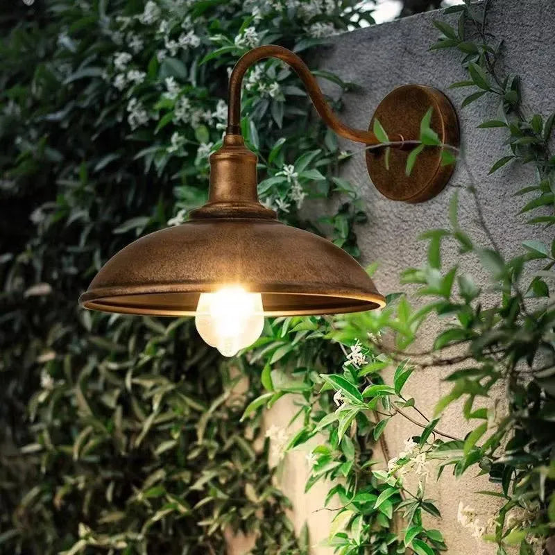 Retro style villa courtyard wall lamp in copper finish with oblique angle mounting