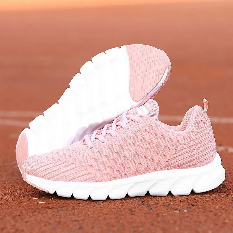Women's running shoes with fly-weave upper in black, pink and white colour options