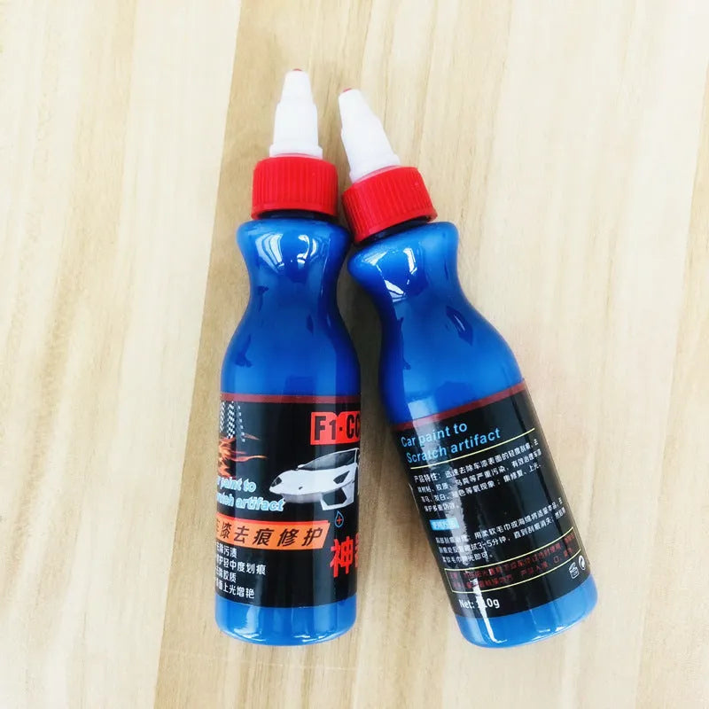 Small blue 10ml automotive scratch repair bottle with integrated applicator brush