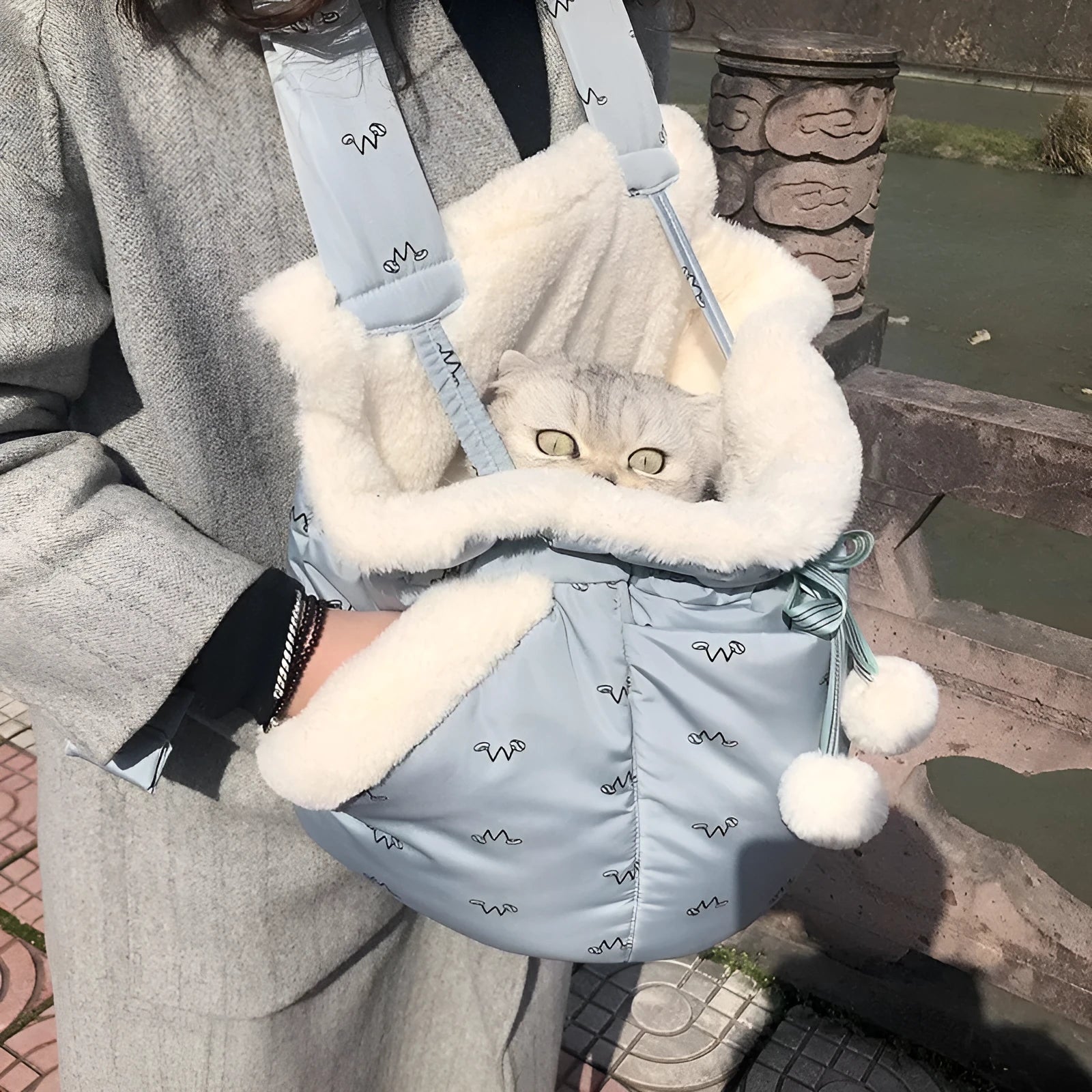 Winter pet carrier backpack in blue and pink made of soft flannel for cats and dogs