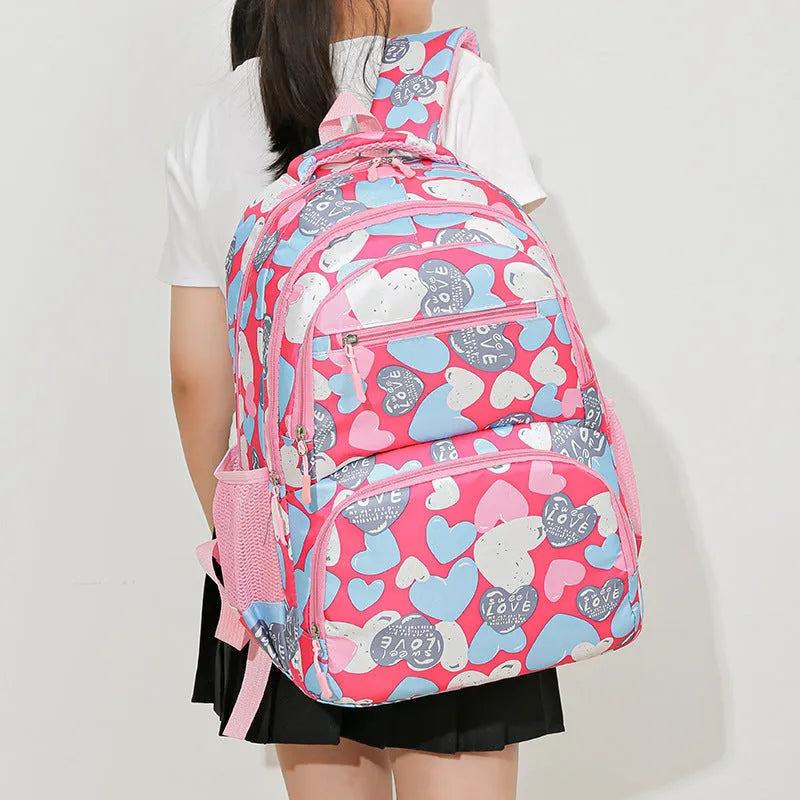 Blue Oxford cloth student backpack with air pillow shoulder straps shown open