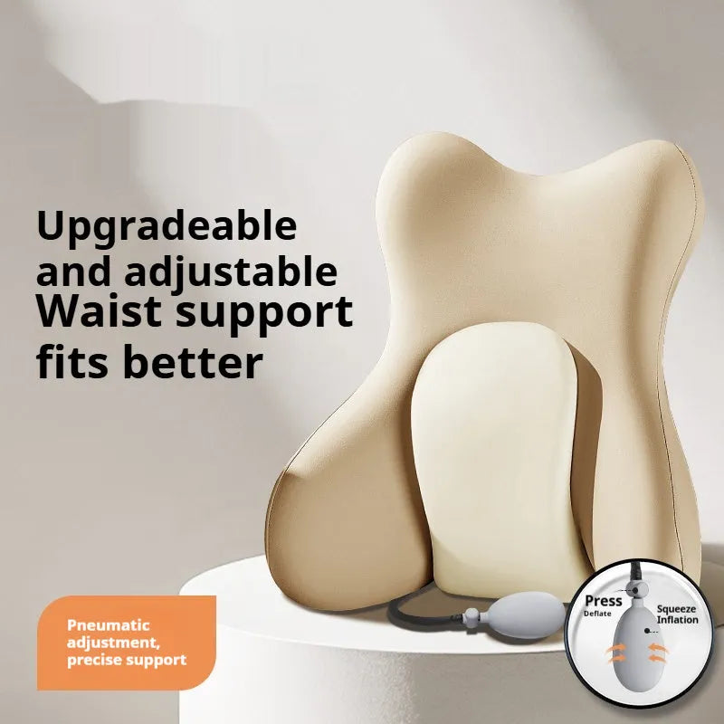 Brown ergonomic memory foam lumbar support pillow with removable cover on a chair.