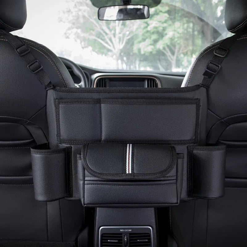 Black leather car seat hanging storage bag with tissue box between car armrests