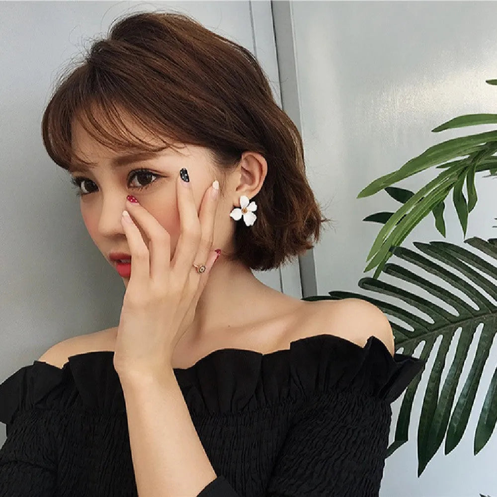 Alloy flower stud earrings for women in white or pink electroplated colour options