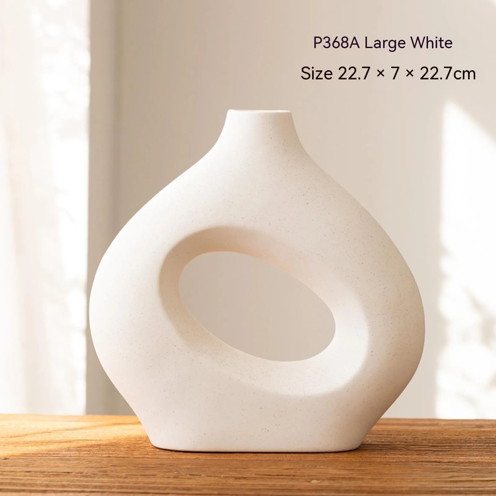 Ceramic circle vase second generation with coloured glaze finish, white large size, on a plain background