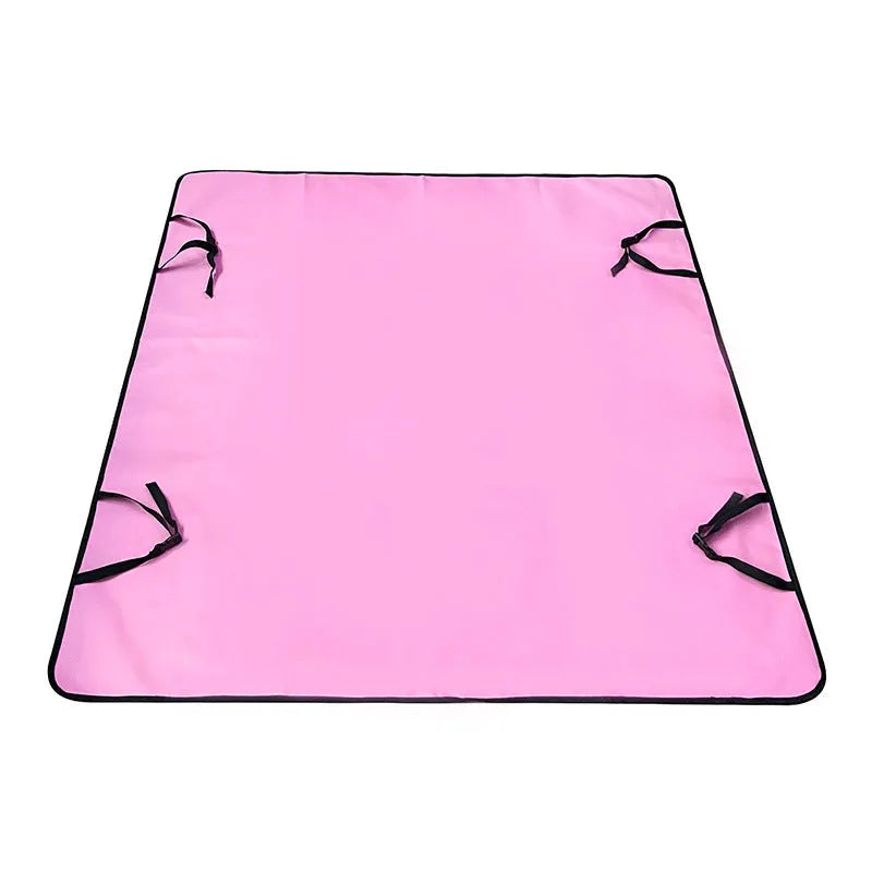 Grey dog bone print water resistant car pet mat measuring 140x110cm on a car rear seat.