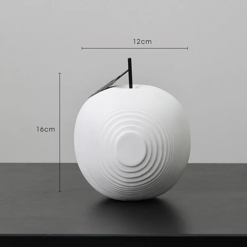 Resin apple and pear decorative crafts in black, white, orange, and blue colours