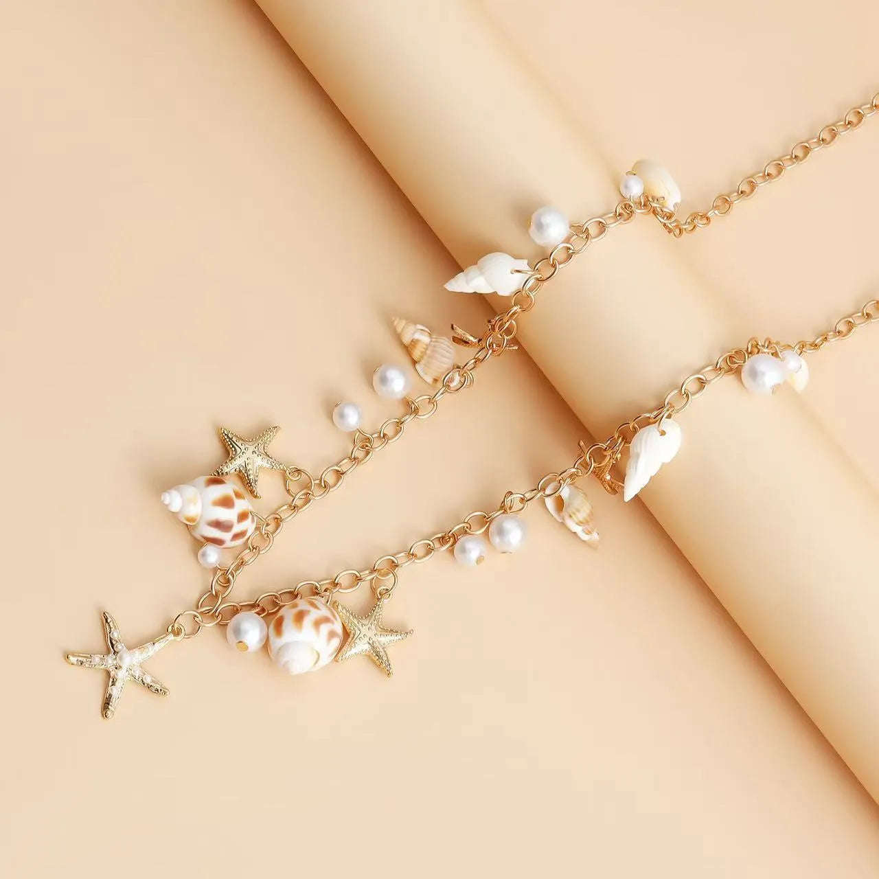 Women's alloy waist chain and bracelet set with star charms for summer beach style
