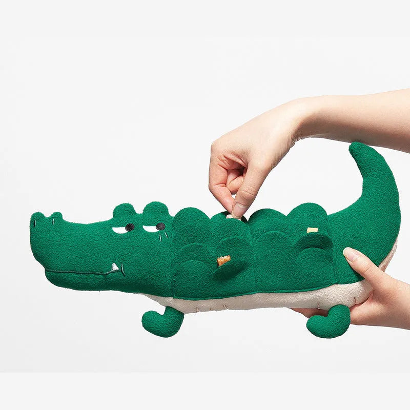 Green plush dog toy measuring 35cm long with soft fabric construction