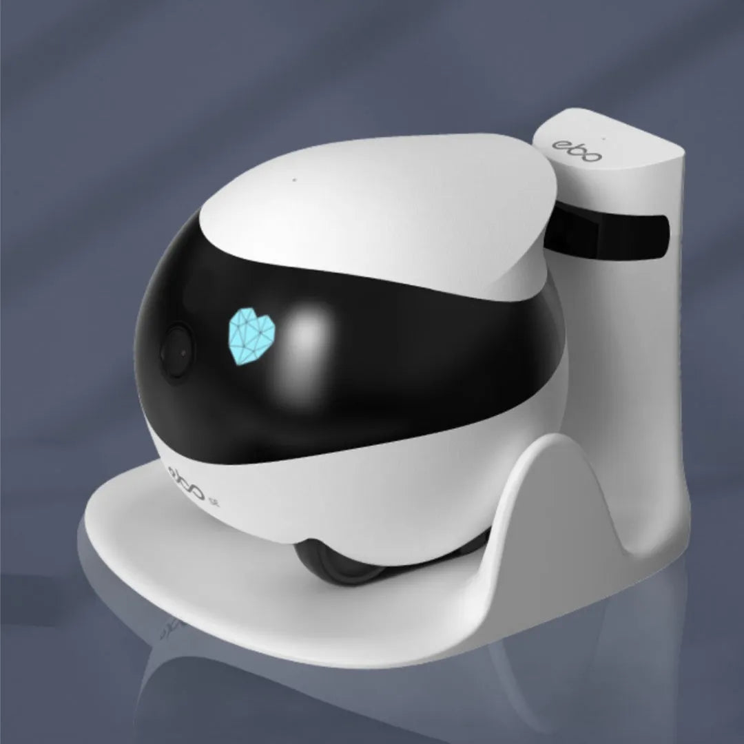 White smart home mobile surveillance robot camera with automatic charging dock