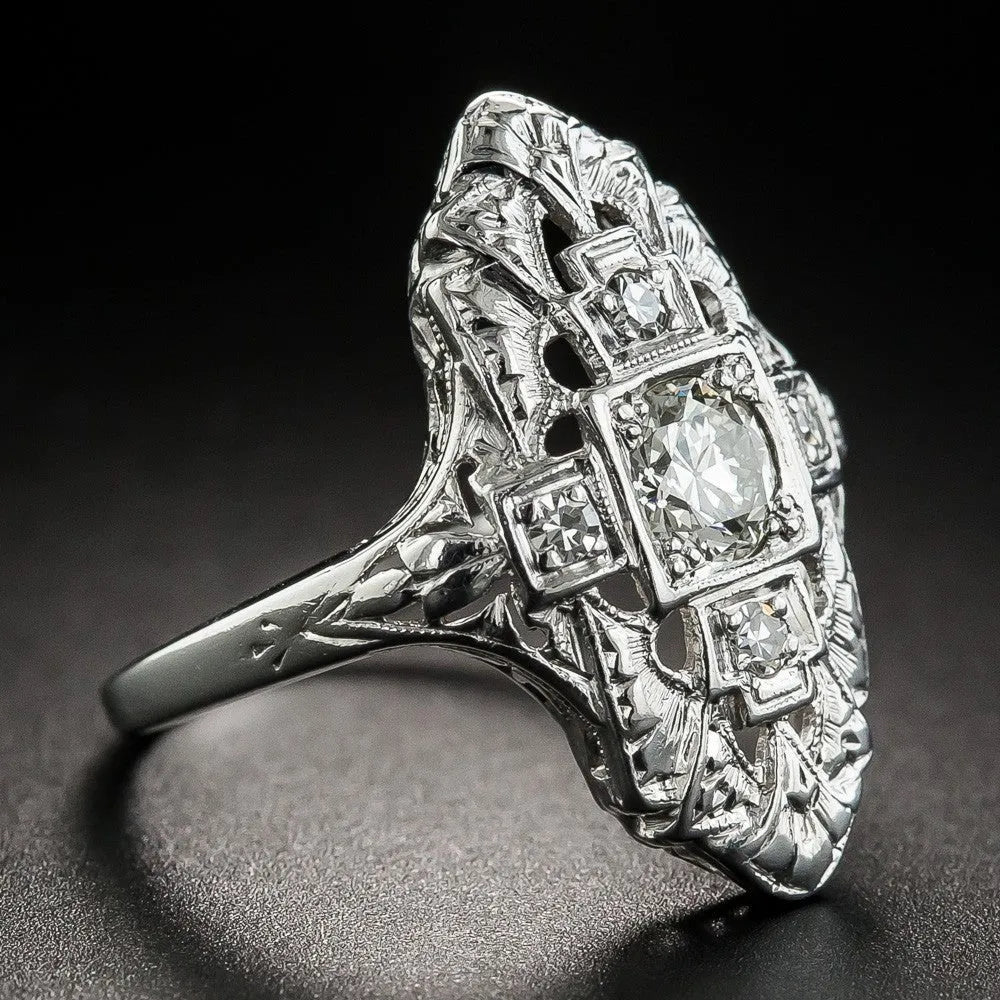Silver electroplated geometric copper ring with hollow out design and diamond stud accents