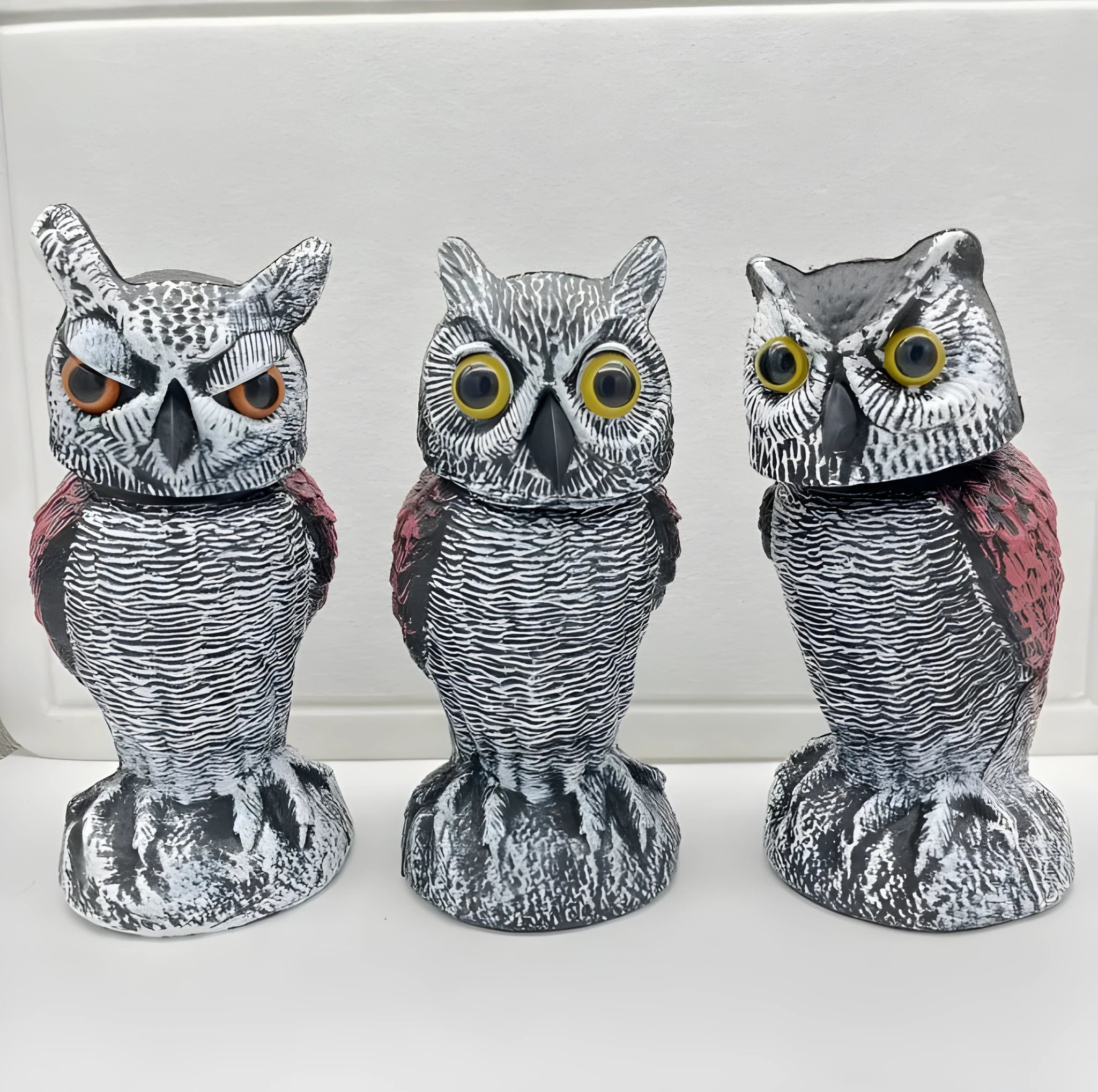 PE plastic artificial owl bird scarer ornament with shaking head, shown in bag-style mounting option.